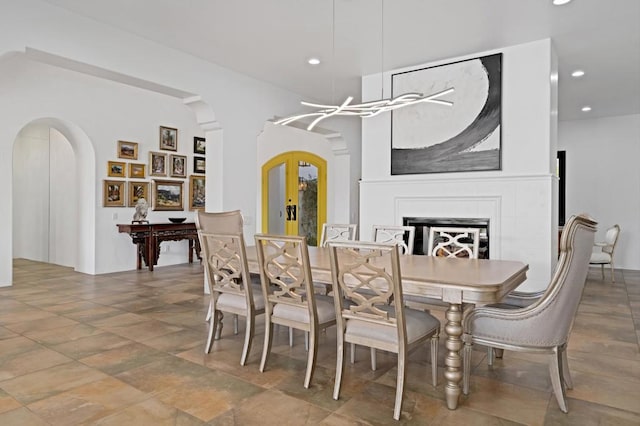 dining room featuring a fireplace