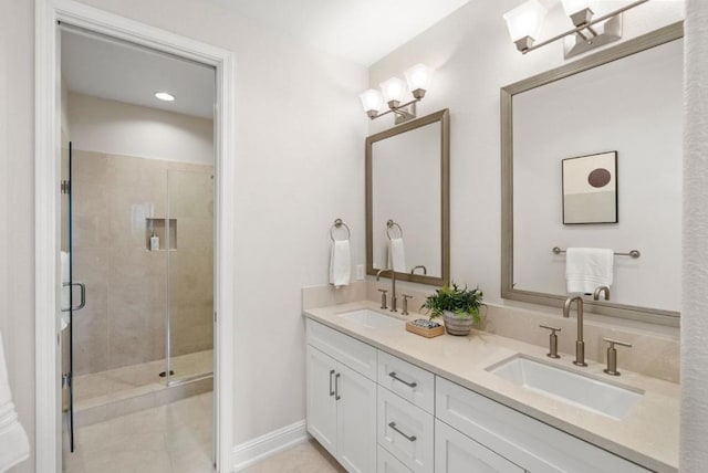 bathroom with vanity and an enclosed shower