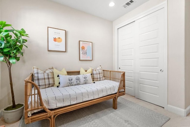 sitting room with carpet flooring