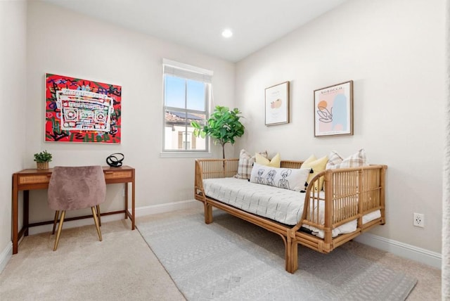 sitting room with light colored carpet