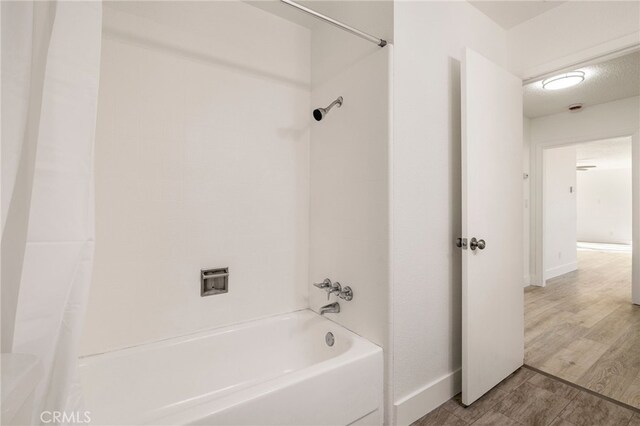 266 E Fig Ln, Corning, CA 96021 - bathroom with  shower combination and hardwood / wood-style floors