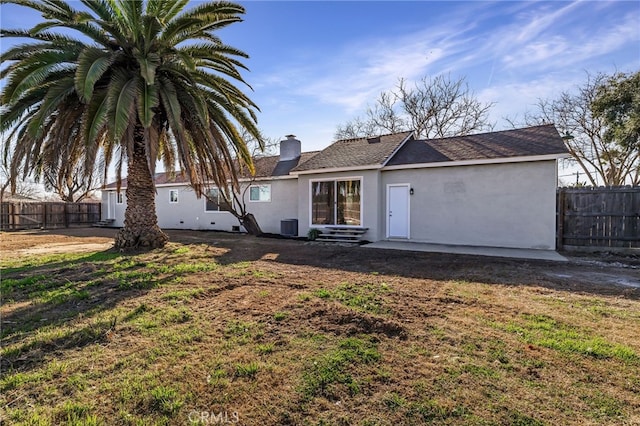 266 E Fig Ln, Corning, CA 96021 - rear view of property with a lawn and cooling unit
