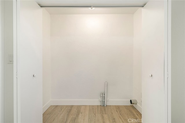 266 E Fig Ln, Corning, CA 96021 - laundry room with light hardwood / wood-style floors