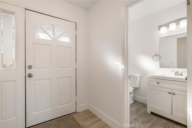 266 E Fig Ln, Corning, CA 96021 - foyer entrance featuring light hardwood / wood-style floors