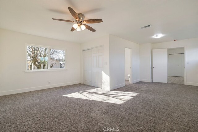 266 E Fig Ln, Corning, CA 96021 - unfurnished bedroom with a closet, ceiling fan, and carpet flooring