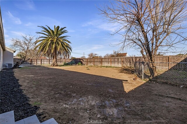 266 E Fig Ln, Corning, CA 96021 - view of yard with central AC unit