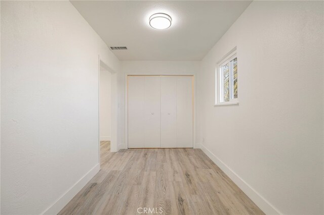 266 E Fig Ln, Corning, CA 96021 - hallway with light hardwood / wood-style flooring
