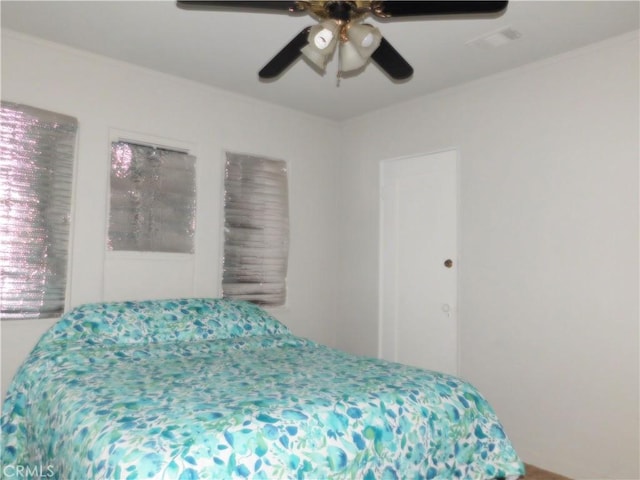 bedroom featuring ceiling fan