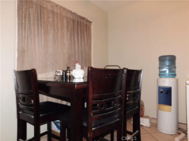 dining space featuring tile patterned flooring