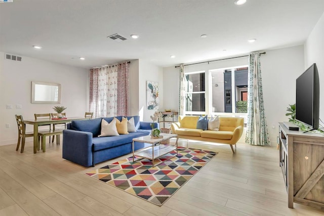 living room featuring light wood-type flooring