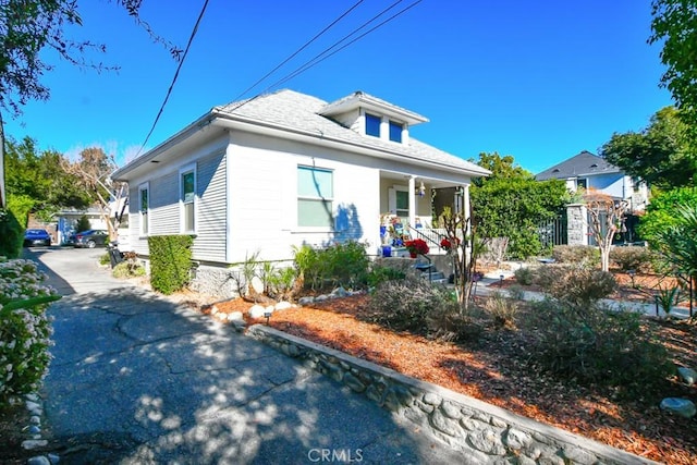 bungalow-style home with covered porch