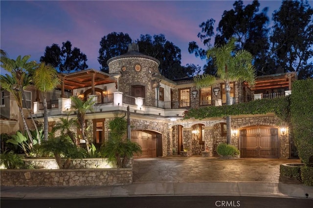 mediterranean / spanish-style house with a balcony