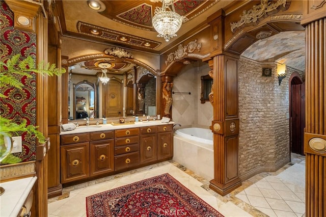 bathroom featuring crown molding, vanity, and tiled bath