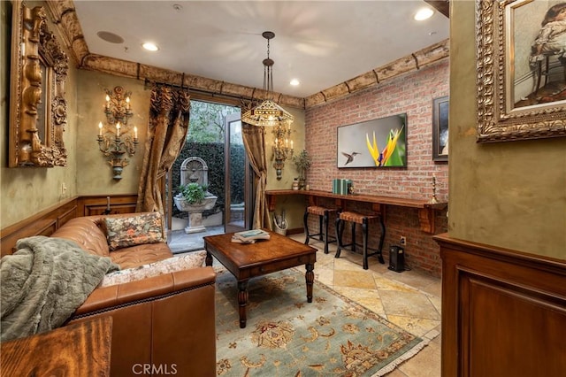 sitting room with brick wall