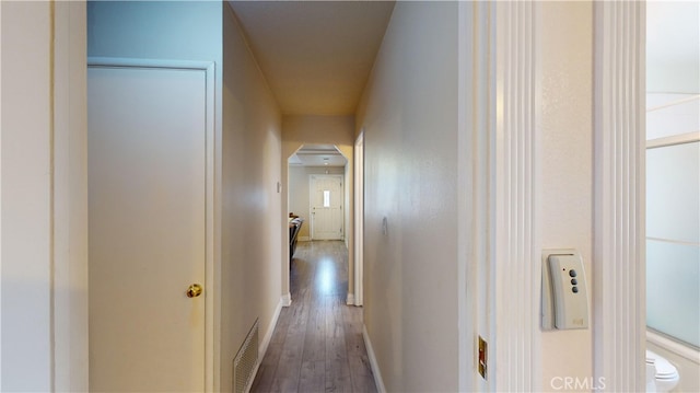 hallway featuring hardwood / wood-style flooring