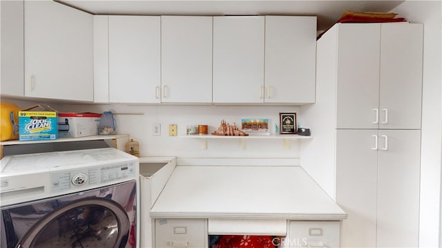 laundry room with washer / clothes dryer and cabinets