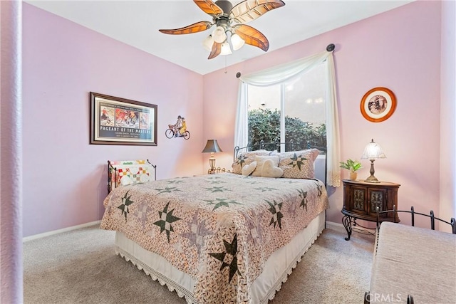 bedroom with light colored carpet and ceiling fan