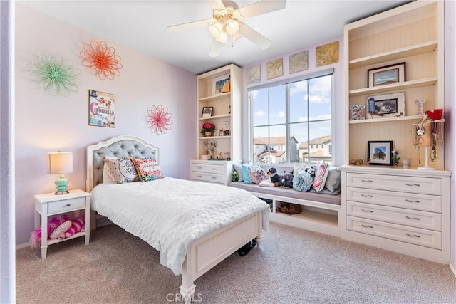 carpeted bedroom featuring ceiling fan