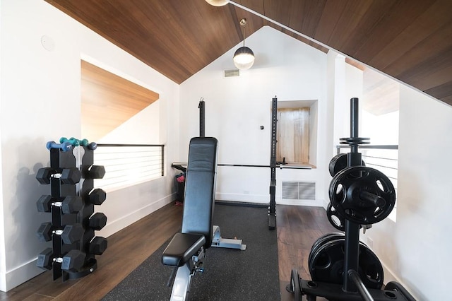 exercise room with wooden ceiling, visible vents, vaulted ceiling, and baseboards