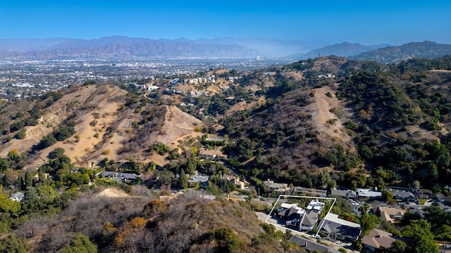 drone / aerial view featuring a mountain view