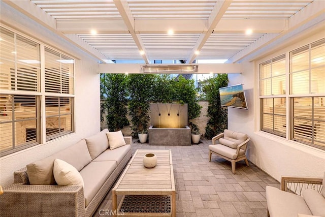 view of patio featuring an outdoor living space and a pergola