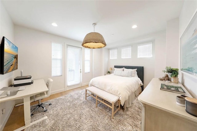 bedroom with light wood-type flooring