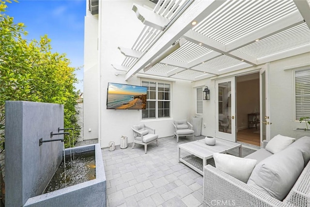 view of patio / terrace featuring an outdoor living space and a pergola