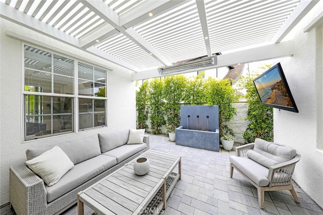 view of patio / terrace featuring outdoor lounge area and a pergola