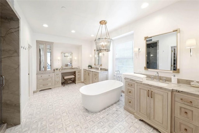 bathroom with vanity, a chandelier, and plus walk in shower