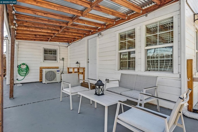 view of patio / terrace with ac unit and outdoor lounge area