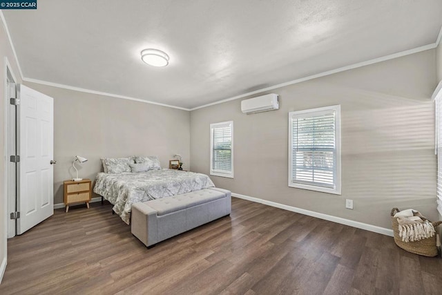 bedroom with dark wood-type flooring, crown molding, and a wall mounted AC