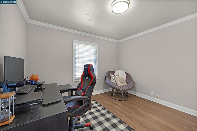 office space featuring ornamental molding and wood-type flooring