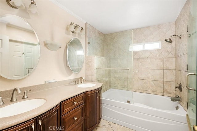 bathroom with vanity, tile patterned floors, and bath / shower combo with glass door