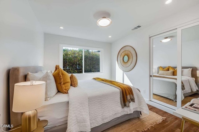 bedroom featuring hardwood / wood-style flooring