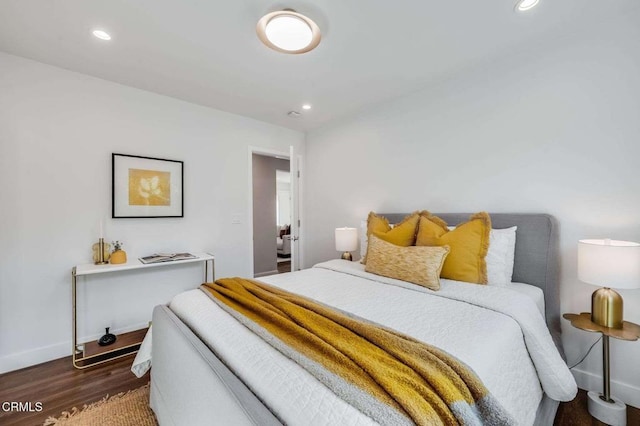 bedroom featuring dark hardwood / wood-style floors