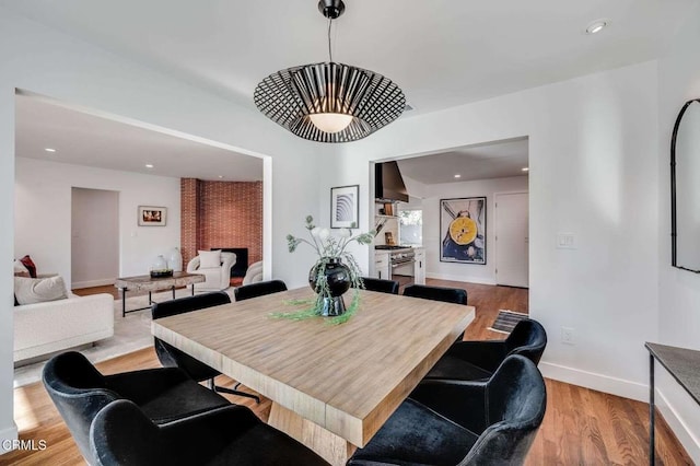 dining room with light hardwood / wood-style floors