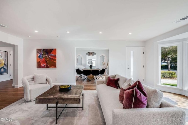 living room with light hardwood / wood-style floors