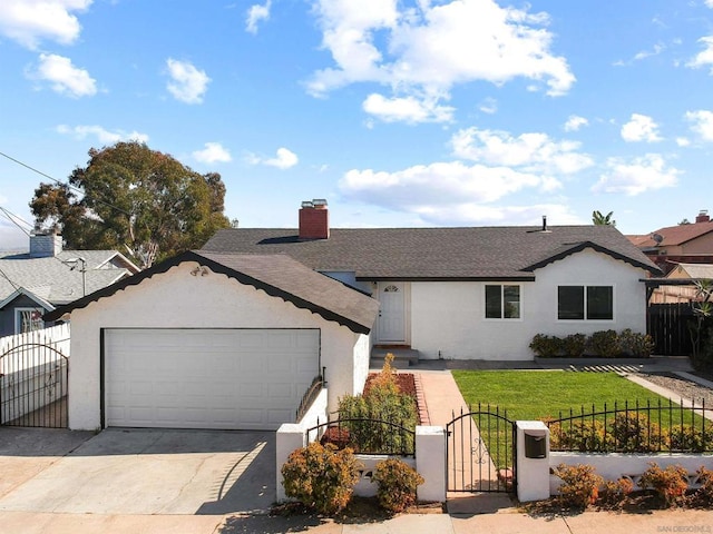 single story home featuring a garage and a front yard