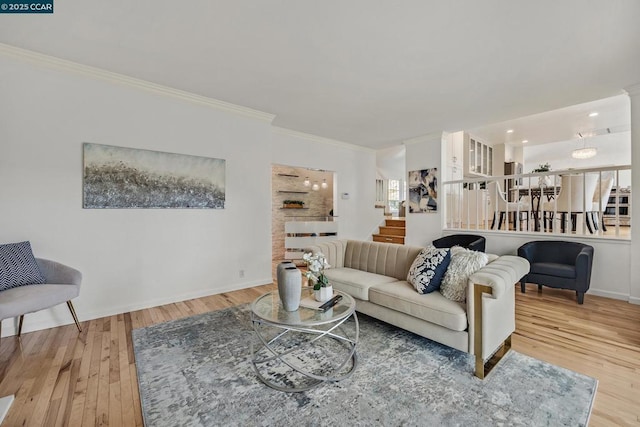 living room featuring crown molding and wood-type flooring