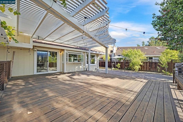 wooden deck with a pergola