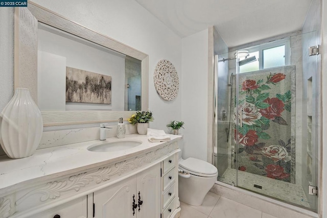 bathroom featuring toilet, tile patterned flooring, a shower with shower door, and vanity