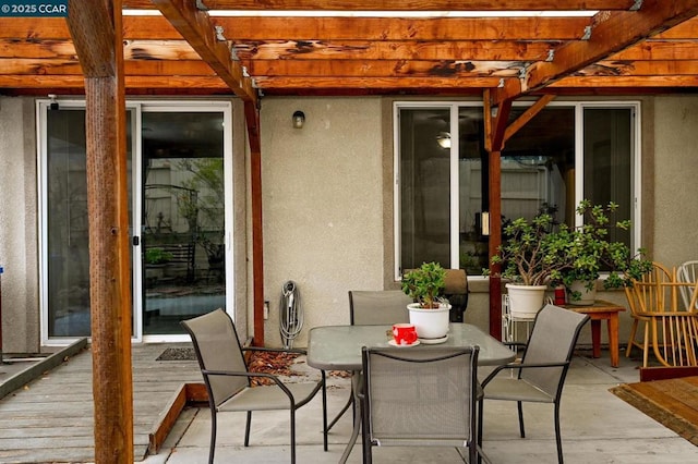 view of patio / terrace featuring a deck and a pergola