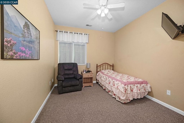 bedroom with ceiling fan and carpet