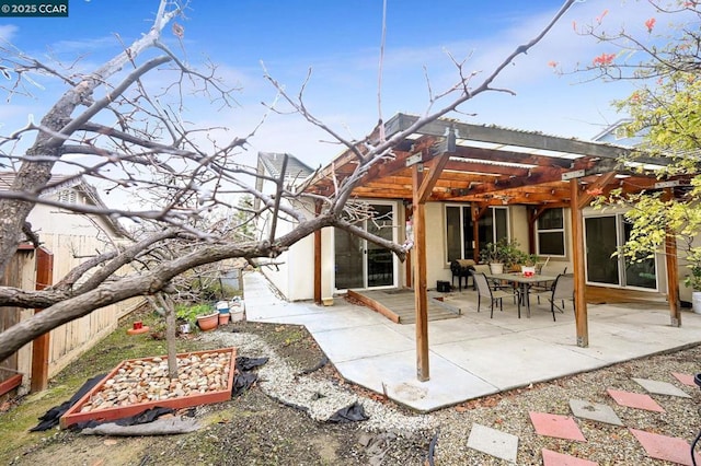 back of house with a patio and a pergola