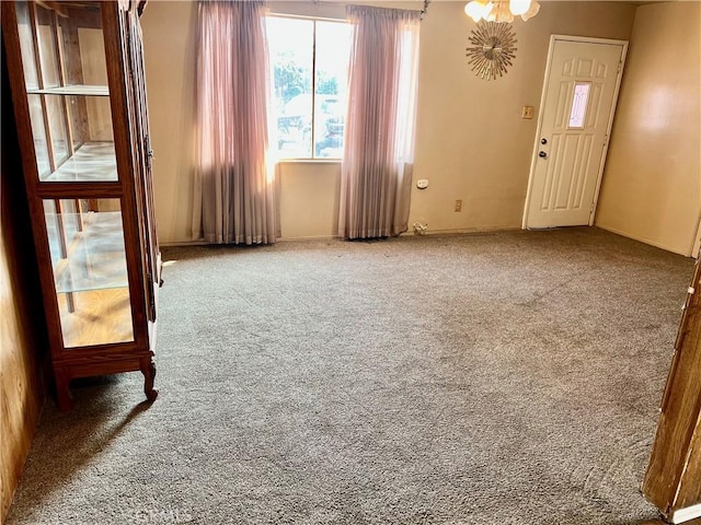 view of carpeted spare room