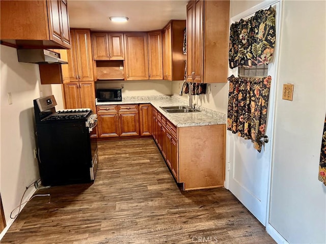 kitchen with sink, dark hardwood / wood-style floors, and gas range