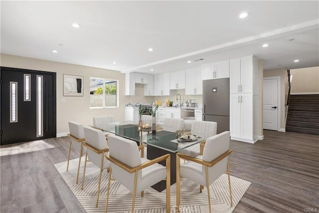 dining room featuring hardwood / wood-style flooring