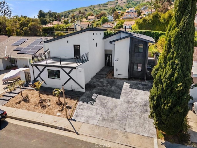 birds eye view of property with a mountain view