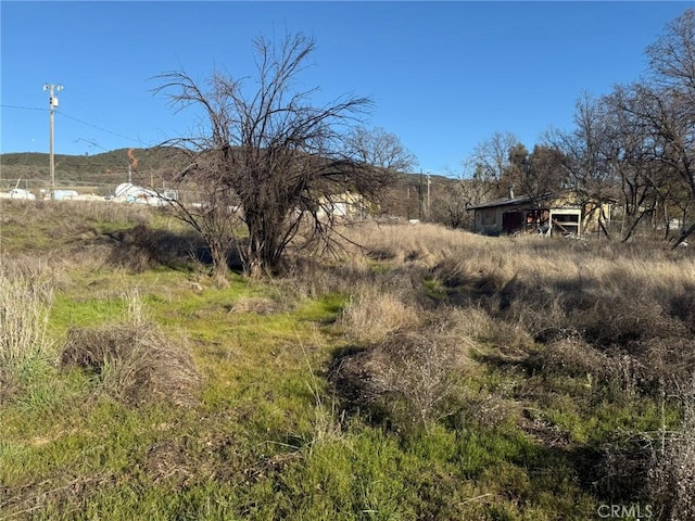 view of landscape with a mountain view and a rural view