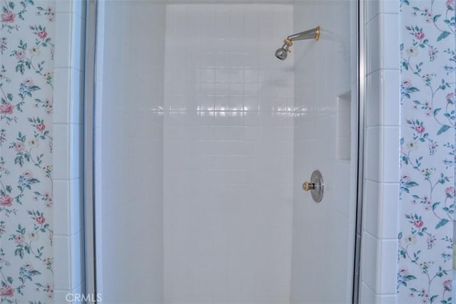 bathroom featuring an enclosed shower